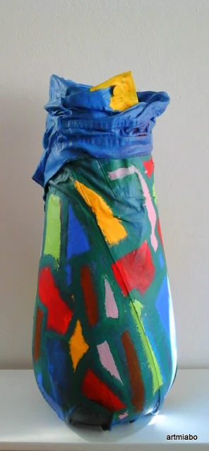 'Self Worth': Jeans draped on clay pot: by miabo enyadike, SOLD