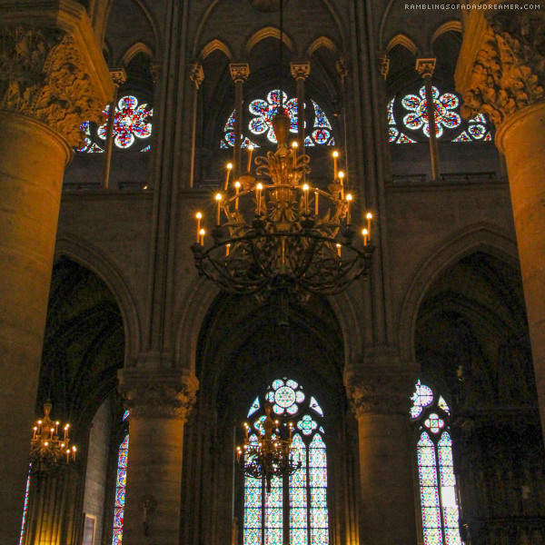 Notre Dame Cathedral Paris France interior chandeliers and stained glass windows