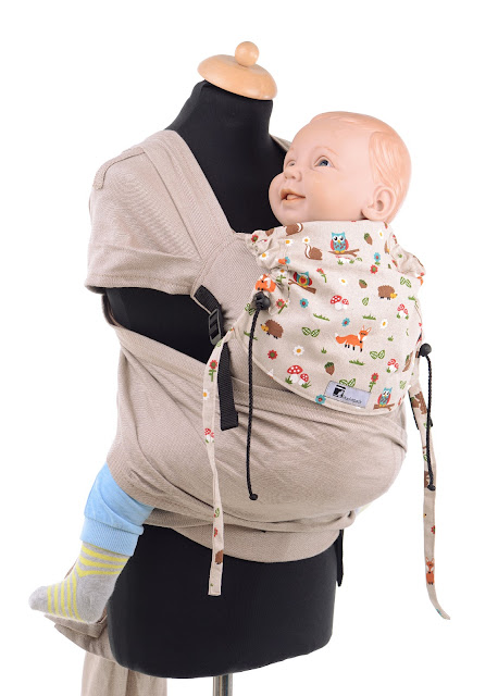 Stufenlos mitwachsende Babytrage aus Tragetuchstoff, auffächerbare Träger, ergonomisch geformter Hüftgurt mit Schnalle, Bauchtrage, Rückentrage, Hüfttrage.