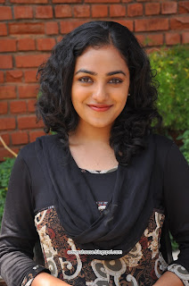 Nitya Menon cute black dress stills