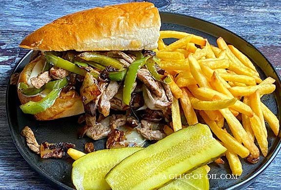 Philly cheesesteak with fries.