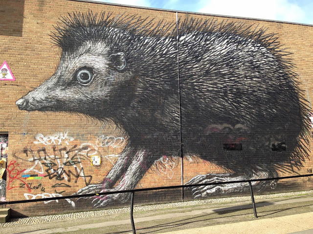 London Shoreditch city walk Belgian street artist ROA  The Squid Stories 