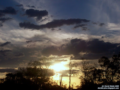 Dramatic Sunset with Illuminated Irregular Coloured clouds against the Skyline (Horizon)