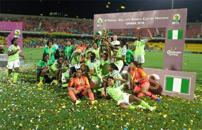 the super falcons celebrate AWCON title winners
 www.honawesome.com