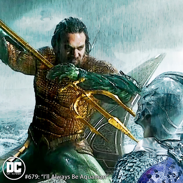 jason momoa as Aquaman holding his trident to Oceanmaster's throat in the rain