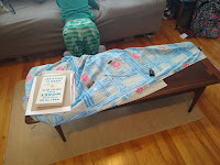 Kid and messy coffee table and cloth
