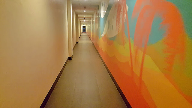 lower ground hallway to the swimming pool of Waterfront Mactan Airport Hotel & Casino