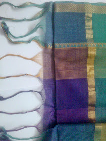 Threads ties at the end of the pallu to a Saree