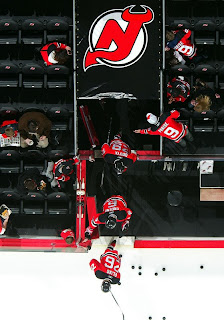 NEWARK, NJ - JANUARY 30: Patrik Elias #26, Andy Greene #6, and Johnny Oduya #29 of the New Jersey Devils take the ice to warm up before playing against the Pittsburgh Penguins at the Prudential Center on January 30, 2009 in Newark, New Jersey. (Photo by Jim McIsaac/Getty Images)