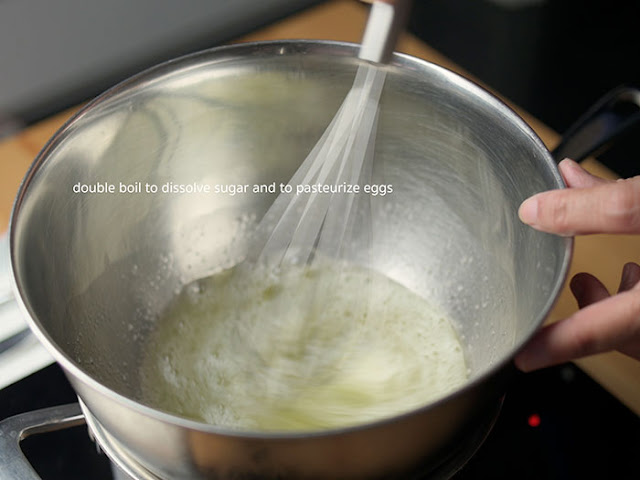 Cook over simmering water to dissolve sugar as well as to pasteurise egg white.