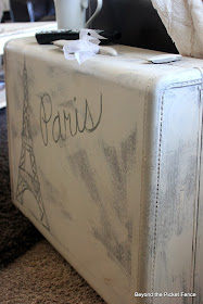 Paris suitcase side table repurposed vintage suitcase http://bec4-beyondthepicketfence.blogspot.com/2014/02/paris-suitcase-side-table.html