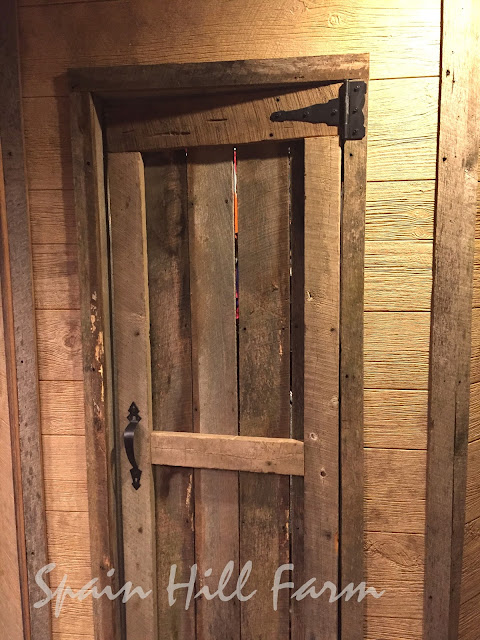 beautiful barnwood bathroom with reclaimed barn door