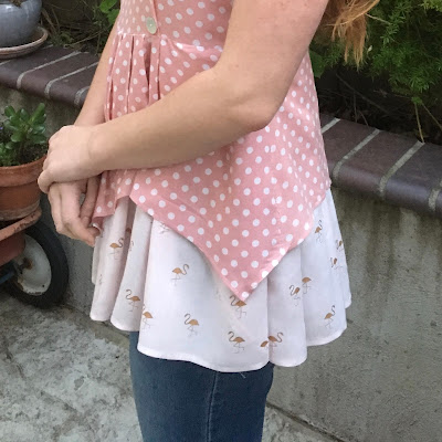 Fun polka dot top with emphasis on added flamingo gathered skirt.