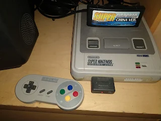 snes con mando 8 bitdo