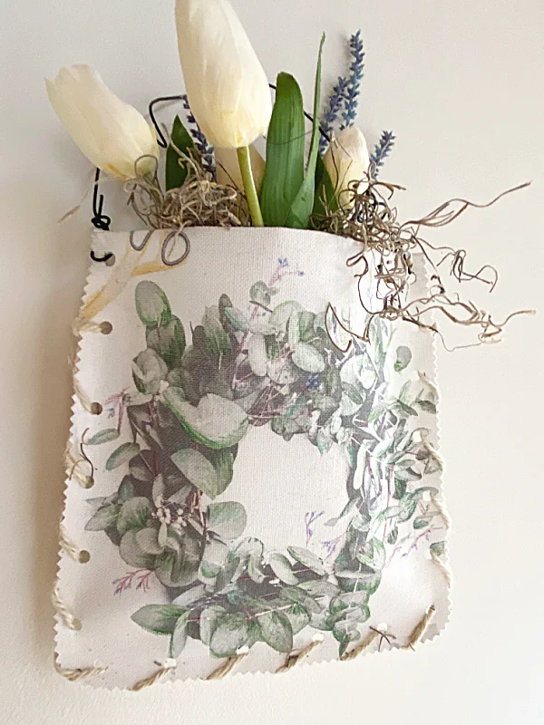 printed canvas pouch with faux flowers