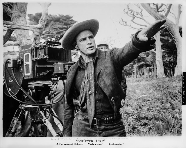 Lobby card featuring Marlon Brando at the reigns of One-Eyed Jacks