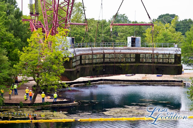 The 400-ton Submarine Theater is lifted out of Spring Lake at Aquarena Center, Texas State University-San Marcos. Photo by Lisa On Location photography.