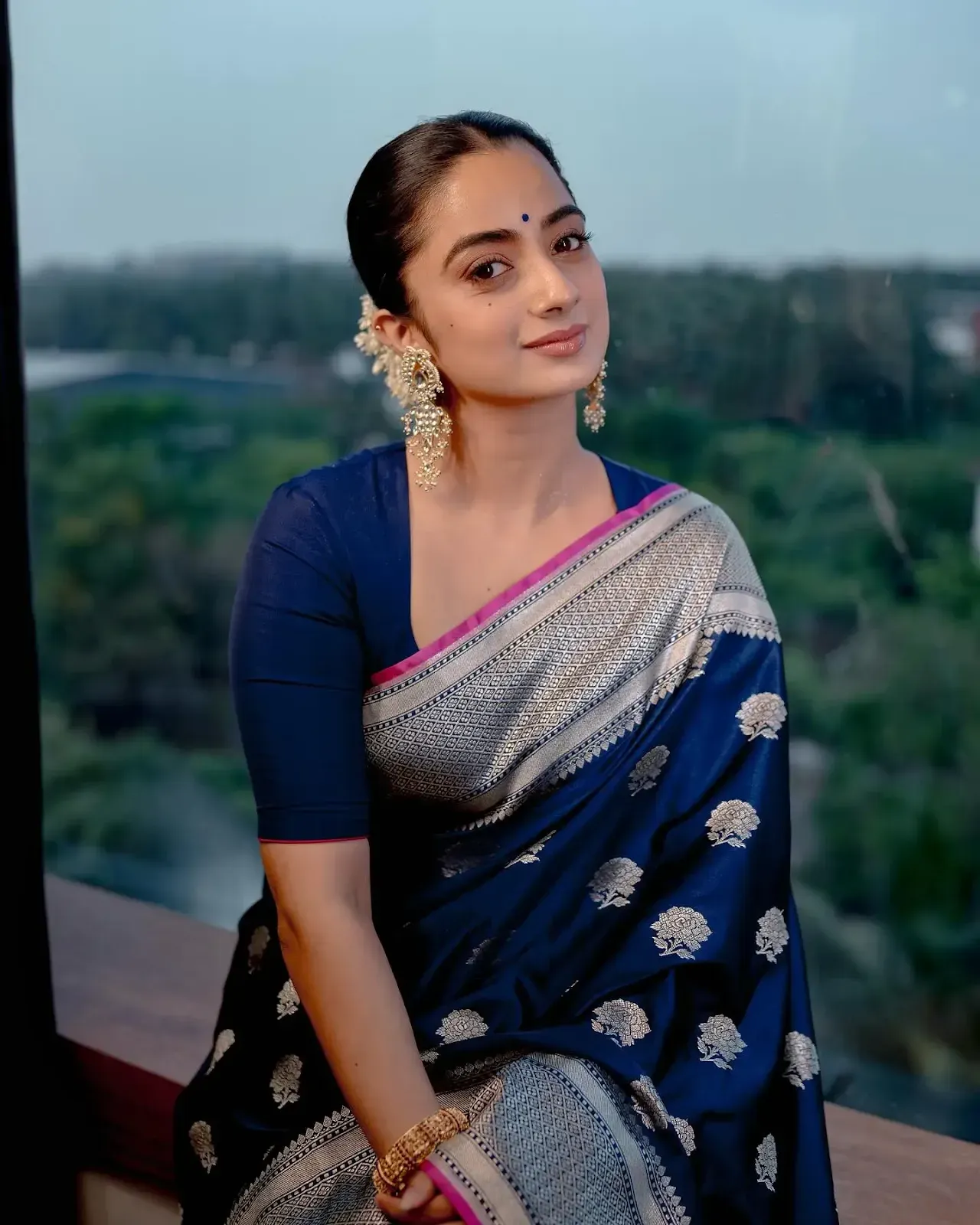 Actress Namitha Pramod posing gracefully in a classic ethnic look