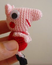 http://amigurumilacion.blogspot.com.es/2014/09/mini-peppa-pig-amigurumi-patron-libre.html