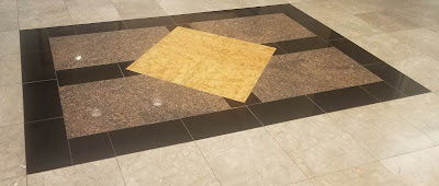 Patterned marble floor at a bank