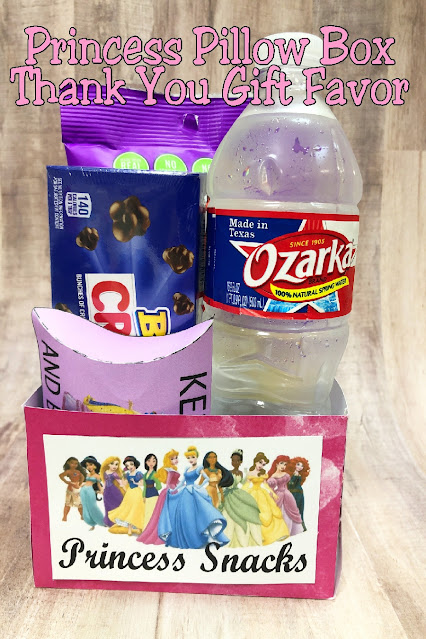 Enjoy a fun family movie night or movie at your Princess party with this easy Princess Movie Snack Box printable.  Fill with popcorn, treats, and a drink for the perfect addition to your Princess movie night.