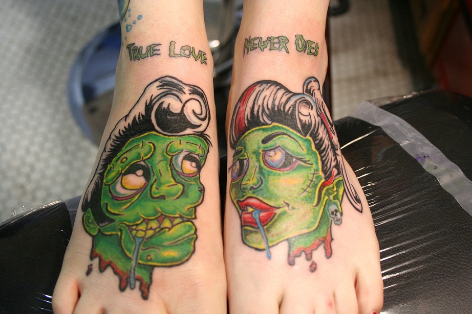 This tattoo is soooooooo cute I mean look at it Zombies and love and cute