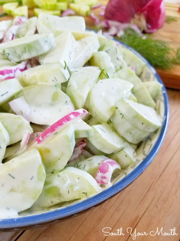 Creamy Cucumber Salad! A German-style cucumber salad recipe with a cool and creamy dressing made with sour cream.
