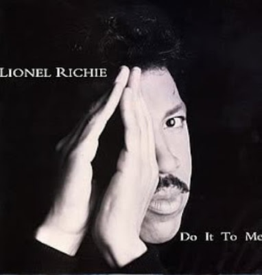 Lionel Richie eye covered Illuminati style