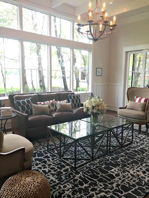 living space with wood chandelier