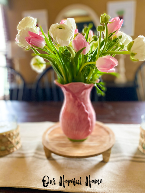 pink vase tulips ranunculus wood riser