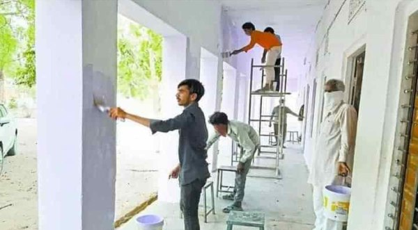 labourers painting school