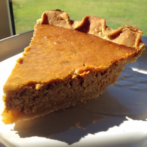 Pumpkin pie is all about the spices, the texture and flavor of pumpkin, and that burnt orange color.  I love pumpkin pie.  I love the simplicity. I love the warm and inviting color.  I love that it embodies seasonal flavors in a not-too-sweet package.