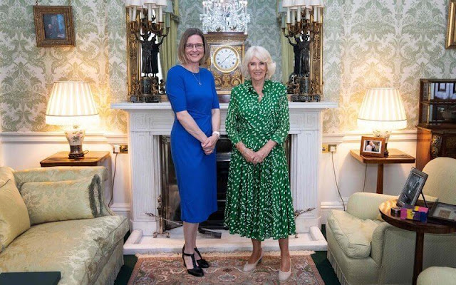 Queen Camilla wore a green Audrey drapery dota dress by Samantha Sung. Colonel Ruth Weir. Bee Garden Party at Marlborough House
