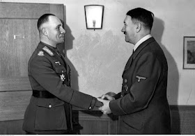 Adolf Hitler and General Erwin Rommel at Rastenburg, 21 March 1942 worldwartwo.filminspector.com