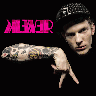 This dude with the mean tattoos goes by the name of DJ Klever 
