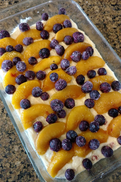 Blueberries and peaches are a winning combination in this cobbler cake where each bite is a burst of flavor.  Try other flavor combinations as well!