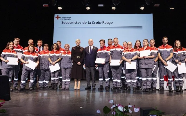 Vice-President of the Monaco Red Cross Princess Charlene wore a black knit wool midi dress by Akris