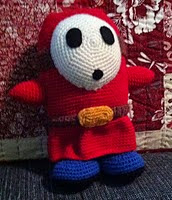 http://www.ravelry.com/patterns/library/shy-guy-amigurumi-pattern