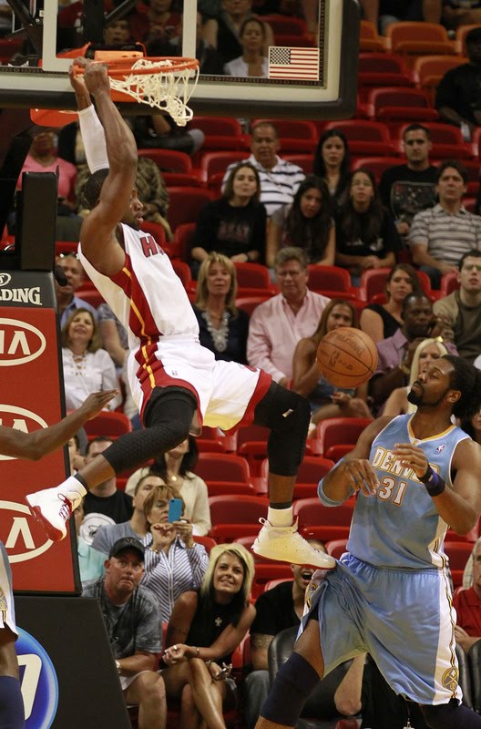 dwyane wade dunking on someone. Dwyane Wade Dunks On Nene