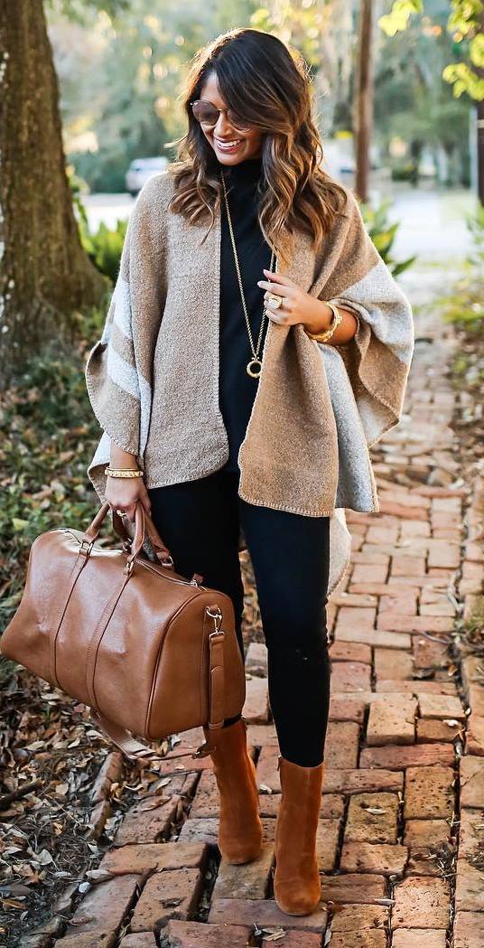 trendy outfit idea: poncho + top + bag + boots + skinny pants