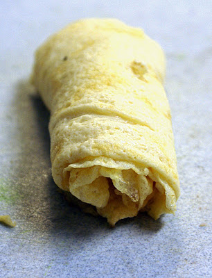 a roll of egg "pancakes"