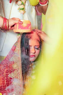 Groom placing sindoor on bride’s forehead – Hindu wedding in Dharan