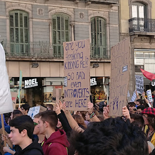 Climate protest in Barcelona, one sign reads: "are you freaking kidding me!? So bad even introverts are here"