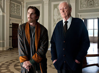 The Dark Knight Rises, Directed by Christopher Nolan, Christain Bale as Bruce Wayne and Michael Caine as his butler Alfred