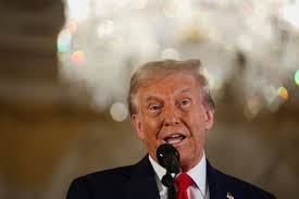 Donald Trump addressing media about VOA closure plans.