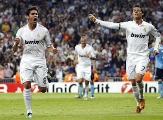 Kaka and Cristiano celebrating the second goal of the team