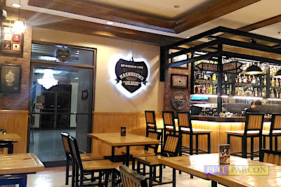 Interior of Hashbrews Café Bistro with tables and chairs