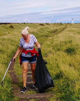 Photo of me collecting litter on Sunday