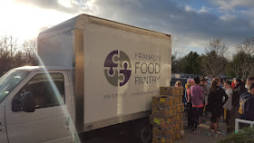 Food Pantry truck loading with the 20 nonperishables for the Franklin Turkey Trot