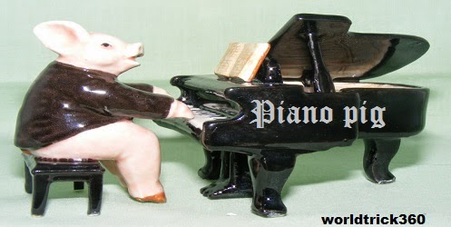 Pig playing a piano